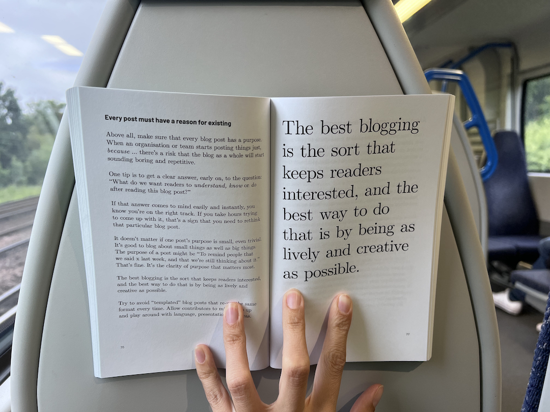 The subject of this review, the Agile Comms Handbook, on a train