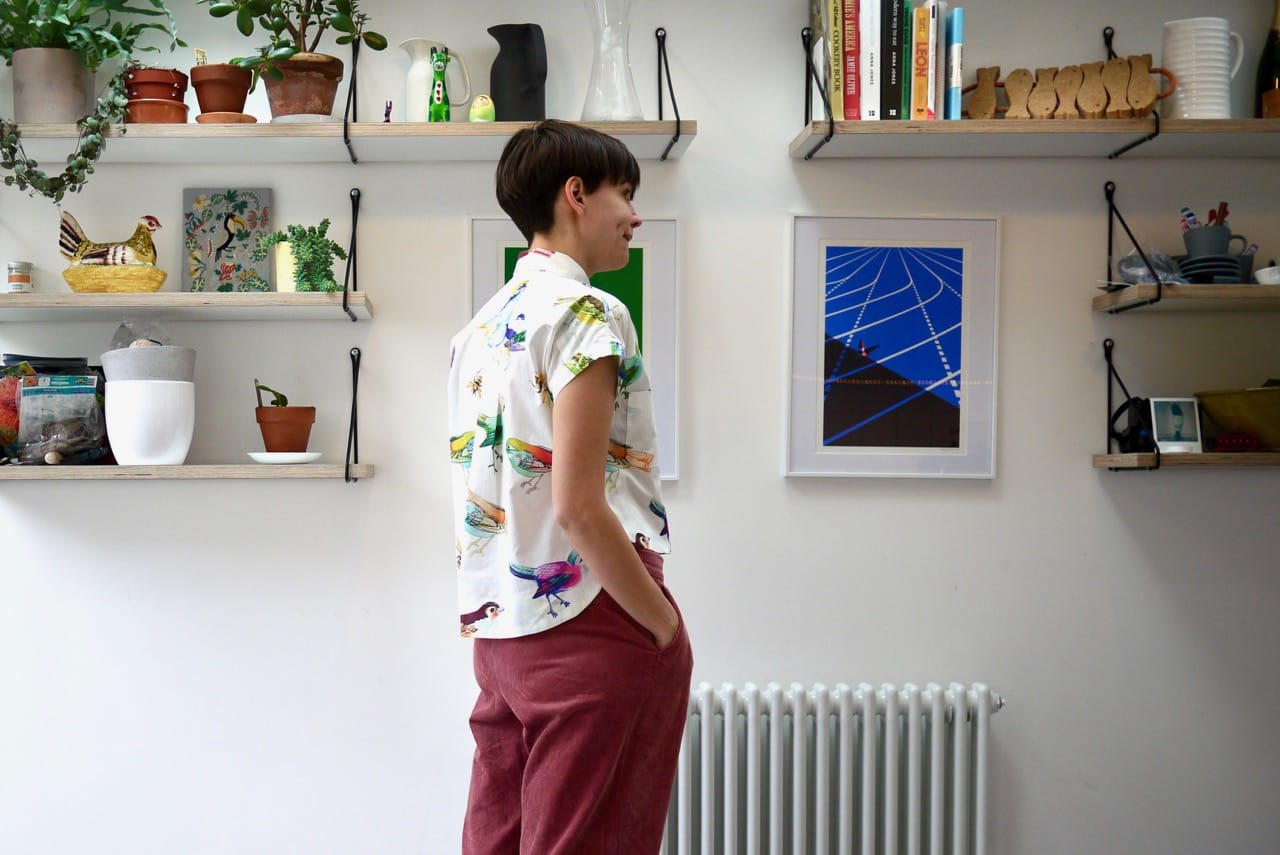 Me in my kitchen in shirt, hands in pockets.